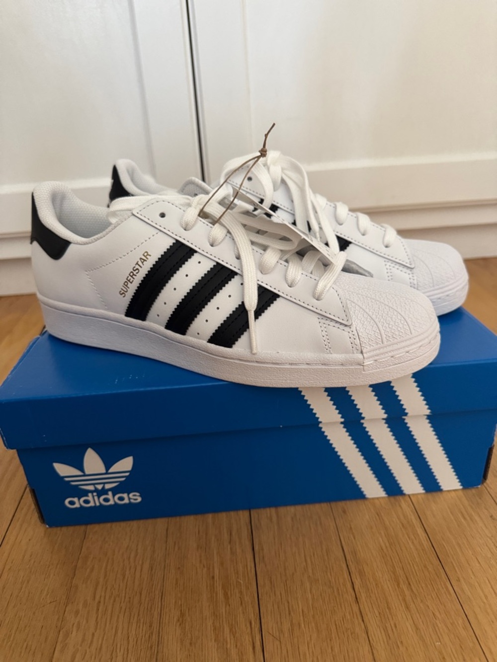 adidas White and Black Superstar Sneakers